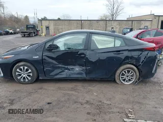 2021 Toyota Prius LE with VIN JTDKAMFP2M3165859, listed as a IAAI auction lot 41943098 with 20,306 mi miles and . Bid and sale history available at DreamBid. Image 15.