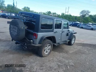 2014 Jeep Wrangler Unlimited Sport with VIN 1C4BJWDG6EL194359, listed as a IAAI auction lot 42182236 with 134,889 mi miles and . Bid and sale history available at DreamBid. Image 4.