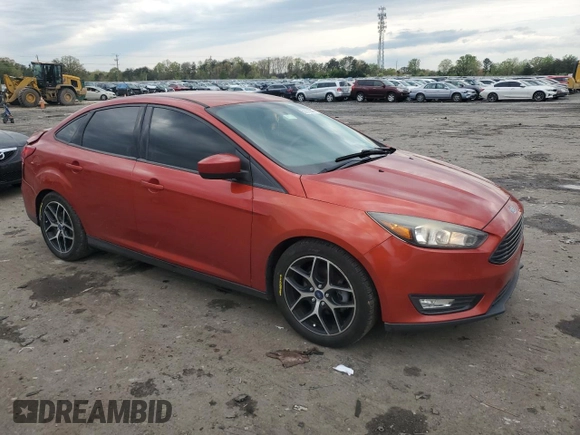 2018 Ford Focus SE with VIN 1FADP3F26JL308996, listed as a Copart auction lot 53331445 with 118,885 mi miles and Salvage Title. Bid and sale history available at DreamBid. Image 4.