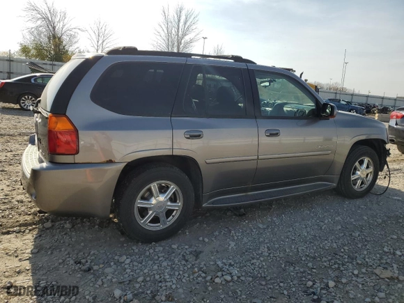 2005 GMC Envoy Denali with VIN 1GKET63M652379567, listed as a Copart auction lot 77862334 with 246,345 mi miles and Non Repairable. Bid and sale history available at carsss.com. Image 3.