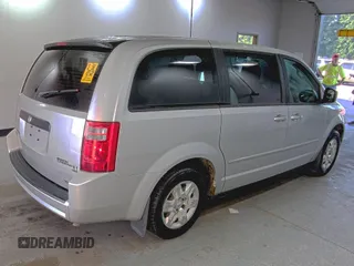 2010 Dodge Grand Caravan SE z VIN 2D4RN4DEXAR412152, wystawiony jako IAAI lot #42825395 z przebiegiem 93 398 mil mil oraz . Historia ofert i sprzedaży dostępna na DreamBid. Obrazek 13.