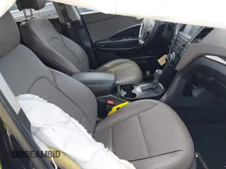 2017 Hyundai Santa Fe 2.4L with VIN 5NMZUDLB4HH030064, listed as a IAAI auction lot 42288147 with 89,297 mi miles and . Bid and sale history available at DreamBid. Image 5.