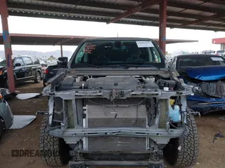 2021 Chevrolet Colorado 4WD Z71 z VIN 1GCGTDEN1M1168618, wystawiony jako IAAI lot #41683565 z przebiegiem 57 697 mil mil oraz . Historia ofert i sprzedaży dostępna na DreamBid. Obrazek 6.
