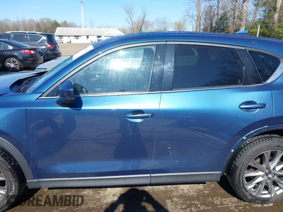 2020 Mazda CX-5 Grand Touring with VIN JM3KFBDM9L0756826, listed as a IAAI auction lot 41866290 with 145,567 mi miles. Bid and sale history available at carsss.com. Image 14.