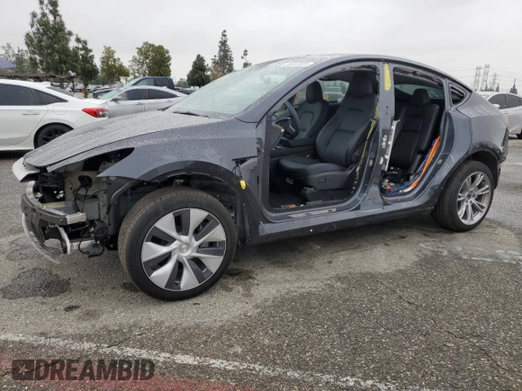 2024 Tesla Model Y with VIN 7SAYGDED5RF093410, listed as a Copart auction lot 50557225 with 6,396 mi miles and Salvage Title. Bid and sale history available at DreamBid. Image 1.