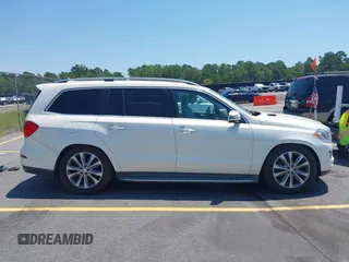 2014 Mercedes-Benz GL 450 with VIN 4JGDF7CE4EA348588, listed as a IAAI auction lot 42601136 with 129,166 mi miles and . Bid and sale history available at DreamBid. Image 14.