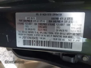 2019 Mazda CX-5 Touring with VIN JM3KFACM8K0694362, listed as a IAAI auction lot 41410185 with 89,443 mi miles. Bid and sale history available at carsss.com. Image 9.