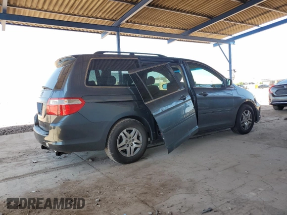 2006 Honda Odyssey EX with VIN 5FNRL384X6B461661, listed as a Copart auction lot 61051915 with 190,578 mi miles and Salvage title. Bid and sale history available at DreamBid. Image 3.