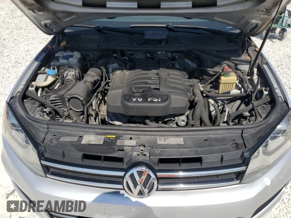 2014 Volkswagen Touareg Sport with VIN WVGEF9BP8ED005445, listed as a Copart auction lot 53694215 with 194,711 mi miles and Salvage Title. Bid and sale history available at DreamBid. Image 12.