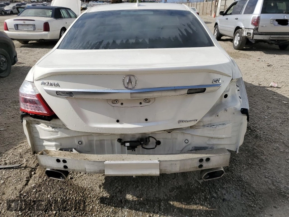 2009 Acura RL Tech Pkg with VIN JH4KB26659C001231, listed as a Copart auction lot 54249085 with 130,144 mi miles and Clean Title. Bid and sale history available at carsss.com. Image 6.