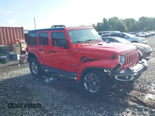 2020 Jeep Wrangler Unlimited Sahara High Altitude with VIN 1C4HJXEG2LW182641, listed as a IAAI auction lot 40130890 with 79,984 mi miles and . Bid and sale history available at DreamBid. Image 1.
