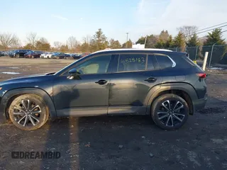 2024 Mazda CX-50 S Premium Plus z VIN 7MMVABEM5RN209065, wystawiony jako IAAI lot #41525183 z przebiegiem 12 297 mil mil oraz . Historia ofert i sprzedaży dostępna na DreamBid. Obrazek 14.