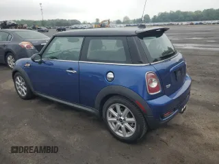 2013 MINI Hardtop S with VIN WMWSV3C55DT387777, listed as a Copart auction lot 56495215 with 53,033 mi miles and Salvage title. Bid and sale history available at DreamBid. Image 2.