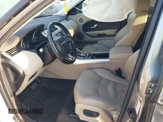 2014 Land Rover Range Rover Evoque Pure Plus z VIN SALVP2BG0EH863440, wystawiony jako IAAI lot #41760065 z przebiegiem 136 997 mil mil oraz . Historia ofert i sprzedaży dostępna na DreamBid. Obrazek 5.