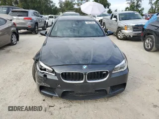 2016 BMW M5 z VIN WBSFV9C51GD595430, wystawiony jako Copart lot #79675834 z przebiegiem 82 351 mil mil oraz Szkoda całkowita • Salvage title. Historia ofert i sprzedaży dostępna na DreamBid. Obrazek 5.