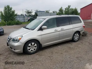 2007 Honda Odyssey EX with VIN 5FNRL38427B513477, listed as a Copart auction lot 62457695 with 216,977 mi miles and Salvage title. Bid and sale history available at DreamBid. Image 1.
