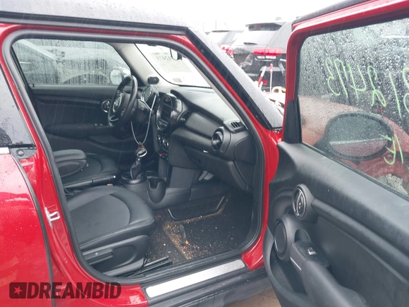 2017 MINI Hardtop 4 Door Cooper with VIN WMWXU1C58H2E18094, listed as a IAAI auction lot 42312473 with 50,482 mi miles and . Bid and sale history available at DreamBid. Image 5.