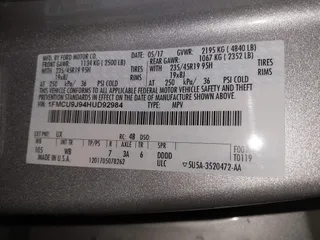 2017 Ford Escape Titanium with VIN 1FMCU9J94HUD92984, listed as a IAAI auction lot 41708720 with 176,550 mi miles. Bid and sale history available at carsss.com. Image 9.