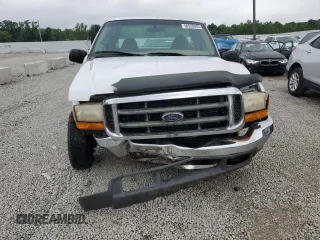 1999 Ford F-250 XL with VIN 1FTNX20S1XEB68189, listed as a Copart auction lot 60920605 with 209,822 mi miles and Salvage title. Bid and sale history available at DreamBid. Image 5.
