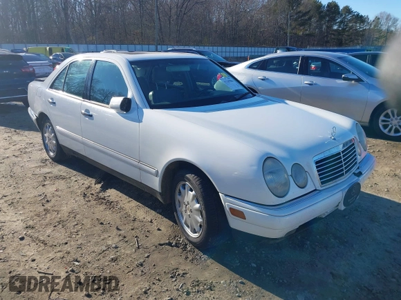 1999 Mercedes-Benz E-Class with VIN WDBJF82H0XX015778, listed as a IAAI auction lot 41269886 with 184,011 mi miles. Bid and sale history available at carsss.com. Image 1.