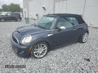 2012 MINI Convertible S with VIN WMWZP3C56CT250886, listed as a Copart auction lot 50027405 with 92,990 mi miles and Salvage Title. Bid and sale history available at DreamBid. Image 1.
