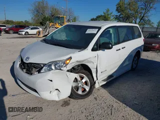 2012 Toyota Sienna with VIN 5TDZK3DC7CS270240, listed as a IAAI auction lot 40539452 with 92,738 mi miles. Bid and sale history available at carsss.com. Image 2.