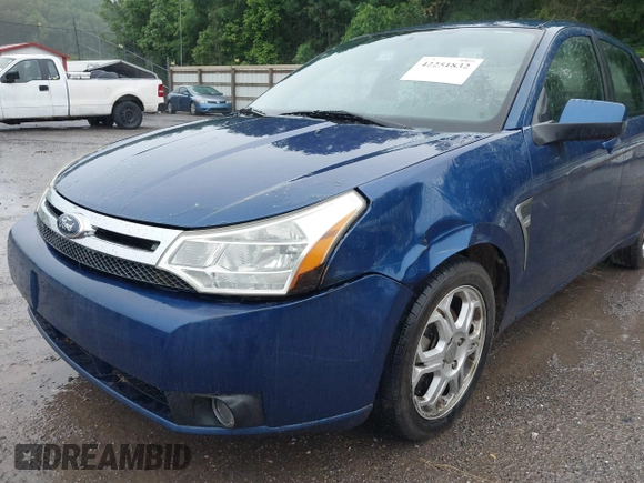 2008 Ford Focus SE z VIN 1FAHP35N58W243547, wystawiony jako IAAI lot #42251832 z przebiegiem 155 554 mil mil oraz . Historia ofert i sprzedaży dostępna na DreamBid. Obrazek 6.