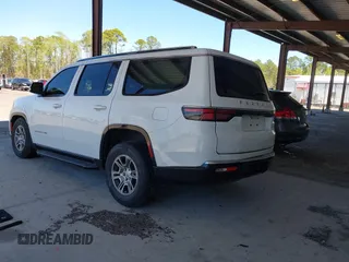 2023 Jeep Grand Wagoneer with VIN 1C4SJUAT5PS509425, listed as a IAAI auction lot 41765704 with 65,656 mi miles and . Bid and sale history available at DreamBid. Image 3.