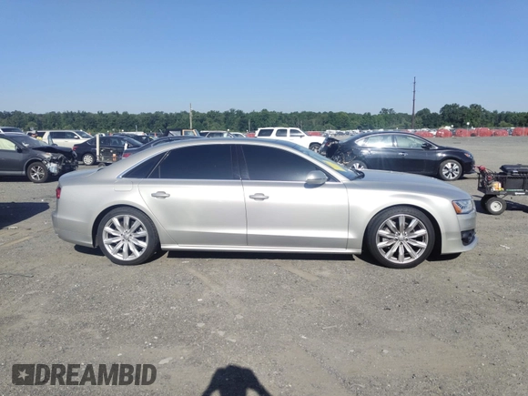 2017 Audi A8 with VIN WAU44AFD3HN014802, listed as a IAAI auction lot 42573537 with 121,096 mi miles and . Bid and sale history available at DreamBid. Image 13.