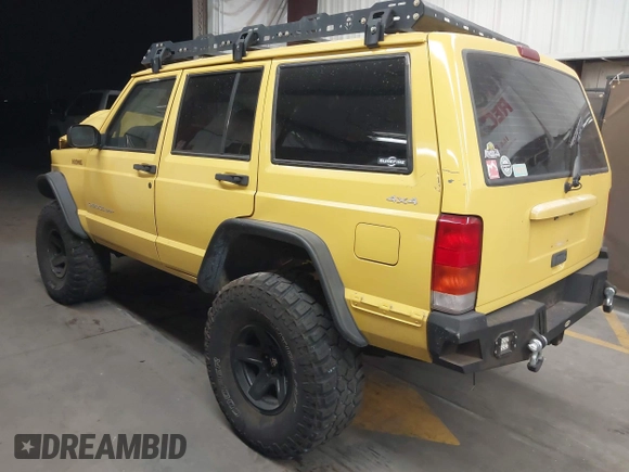 2001 Jeep Cherokee Sport with VIN 1J4FF48S41L580319, listed as a IAAI auction lot 42064564 with 257,534 mi miles and . Bid and sale history available at DreamBid. Image 3.