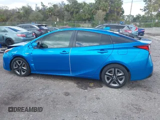 2022 Toyota Prius L Eco with VIN JTDKAMFU5N3165006, listed as a IAAI auction lot 41753470 with 33,567 mi miles and . Bid and sale history available at DreamBid. Image 14.