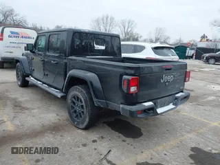 2023 Jeep Gladiator Overland with VIN 1C6HJTFG4PL564093, listed as a IAAI auction lot 41594203 with 37,740 mi miles and . Bid and sale history available at DreamBid. Image 3.