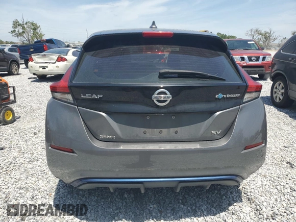 2018 Nissan LEAF S with VIN 1N4AZ1CP2JC301612, listed as a Copart auction lot 52483345 with 99,276 mi miles and Non Repairable. Bid and sale history available at DreamBid. Image 6.