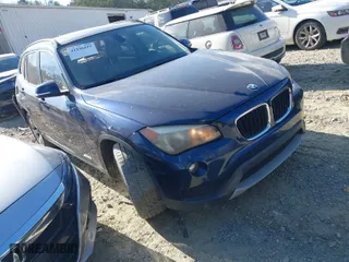 2013 BMW X1 28i with VIN WBAVM1C52DVW46153, listed as a IAAI auction lot 41236419 with 160,732 mi miles. Bid and sale history available at carsss.com. Image 1.