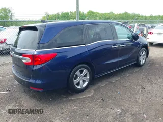 2019 Honda Odyssey EX with VIN 5FNRL6H50KB018150, listed as a IAAI auction lot 42119727 with 94,535 mi miles. Bid and sale history available at carsss.com. Image 4.
