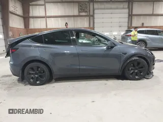 2023 Tesla Model Y Long Range with VIN 7SAYGAEE2PF755674, listed as a IAAI auction lot 41890025 with 24,783 mi miles and . Bid and sale history available at DreamBid. Image 13.