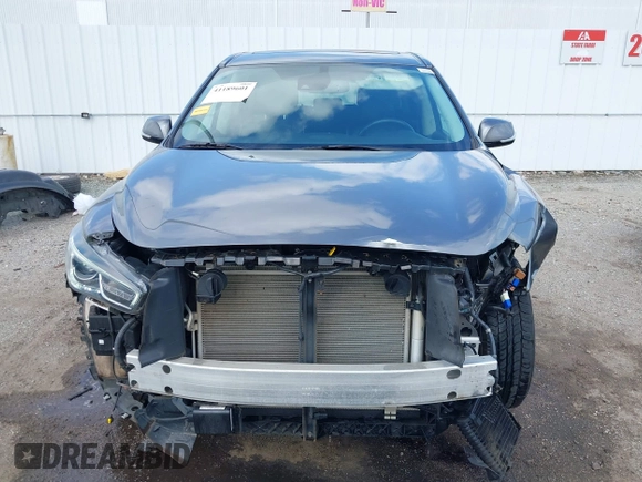 2020 Infiniti QX60 Luxe z VIN 5N1DL0MNXLC523376, wystawiony jako IAAI lot #41189601 z przebiegiem 47 655 mil mil oraz . Historia ofert i sprzedaży dostępna na DreamBid. Obrazek 13.