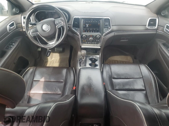 2018 Jeep Grand Cherokee Overland with VIN 1C4RJFCG5JC437508, listed as a Copart auction lot 51814795 with 104,598 mi miles and Salvage title. Bid and sale history available at DreamBid. Image 8.