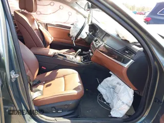 2011 BMW 5 Series 535i xDrive with VIN WBAFU7C56BC771267, listed as a IAAI auction lot 42006086 with 123,249 mi miles. Bid and sale history available at carsss.com. Image 5.