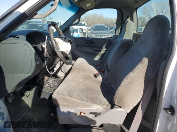2000 Ford F-150 XL with VIN 1FTZF1825YKB19373, listed as a Copart auction lot 52078555 with 124,452 mi miles and Salvage title. Bid and sale history available at DreamBid. Image 7.