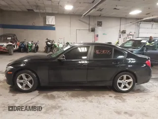 2015 BMW 3 Series 320i xDrive with VIN WBA3C3C54FK202055, listed as a IAAI auction lot 41658775 with 144,505 mi miles and . Bid and sale history available at DreamBid. Image 13.