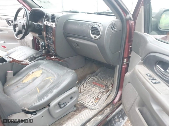2003 GMC Envoy SLT with VIN 1GKDS13S532314397, listed as a IAAI auction lot 41184274 with 232,750 mi miles. Bid and sale history available at carsss.com. Image 5.