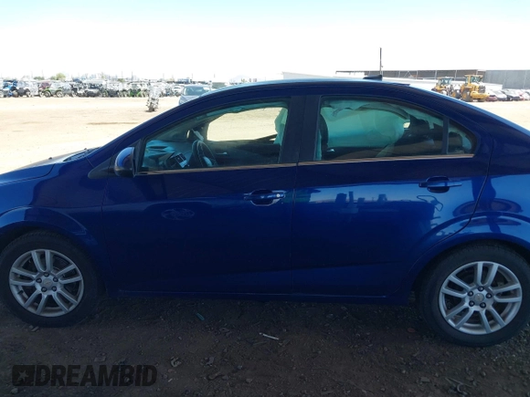 2012 Chevrolet Sonic LT with VIN 1G1JC5SH1C4184320, listed as a IAAI auction lot 42101145 with 207,735 mi miles and . Bid and sale history available at DreamBid. Image 13.
