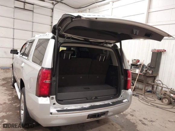 2016 Chevrolet Tahoe LTZ with VIN 1GNSKCKCXGR284827, listed as a IAAI auction lot 41389540 with 93,150 mi miles. Bid and sale history available at carsss.com. Image 3.