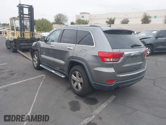 2013 Jeep Grand Cherokee Limited with VIN 1C4RJEBTXDC539433, listed as a IAAI auction lot 42046724 with 266,913 mi miles. Bid and sale history available at carsss.com. Image 3.