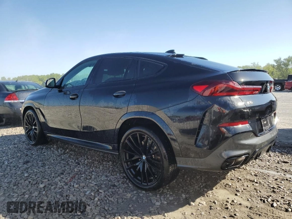 2023 BMW X6 M50i with VIN 5UXCY8C05P9N77000, listed as a Copart auction lot 50704703 with 5,062 mi miles. Bid and sale history available at carsss.com. Image 2.