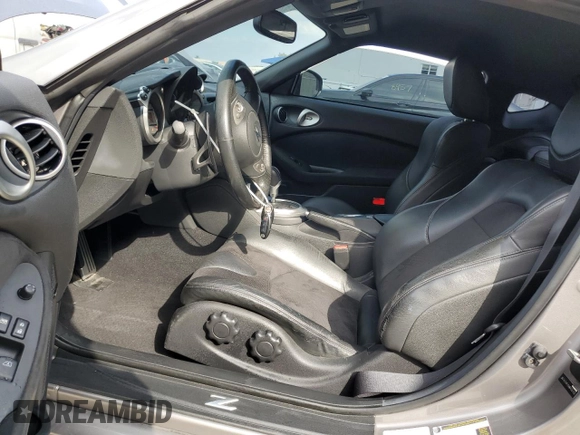 2009 Nissan 370Z z VIN JN1AZ44E69M405389, wystawiony jako Copart lot #43340975 z przebiegiem 31 521 mil mil oraz Szkoda całkowita • Salvage title. Historia ofert i sprzedaży dostępna na DreamBid. Obrazek 7.