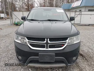 2014 Dodge Journey SXT with VIN 3C4PDCBG1ET142687, listed as a IAAI auction lot 41698232 with 170,521 mi miles. Bid and sale history available at carsss.com. Image 6.