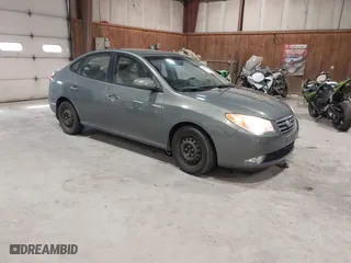 2009 Hyundai Elantra GLS with VIN KMHDU46D99U789712, listed as a IAAI auction lot 41860659 with 153,334 mi miles. Bid and sale history available at carsss.com. Image 1.