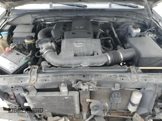 2005 Nissan Frontier LE with VIN 1N6AD07U75C452872, listed as a Copart auction lot 54954555 with 230,702 mi miles and Salvage title. Bid and sale history available at DreamBid. Image 11.